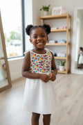 Colorful dress with cartoon design on a white garment